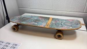 lot 274 image: Decorated Skateboard with Stickers and Art