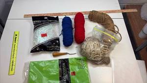 lot 292 image: Craft Supply Bundle - Yarn, Shreds and Table Cover