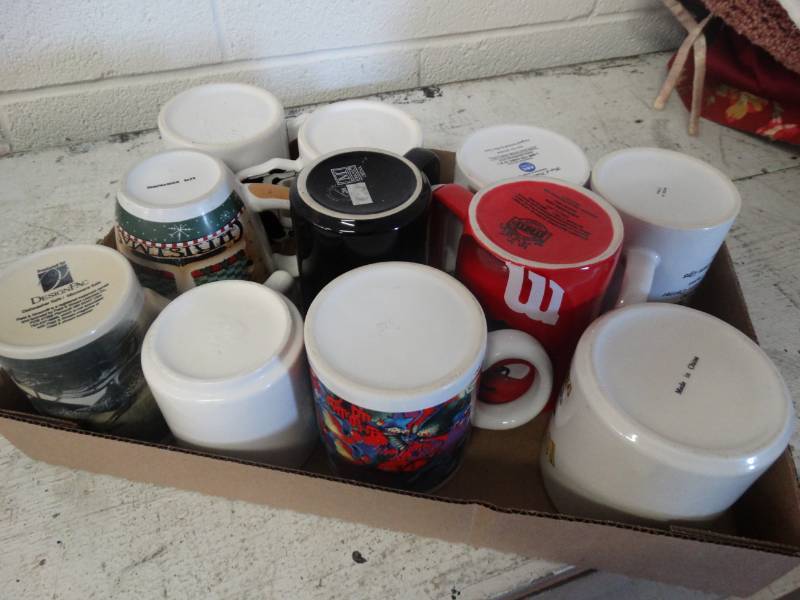 lot 7575 image: Lot of themed coffee mugs.