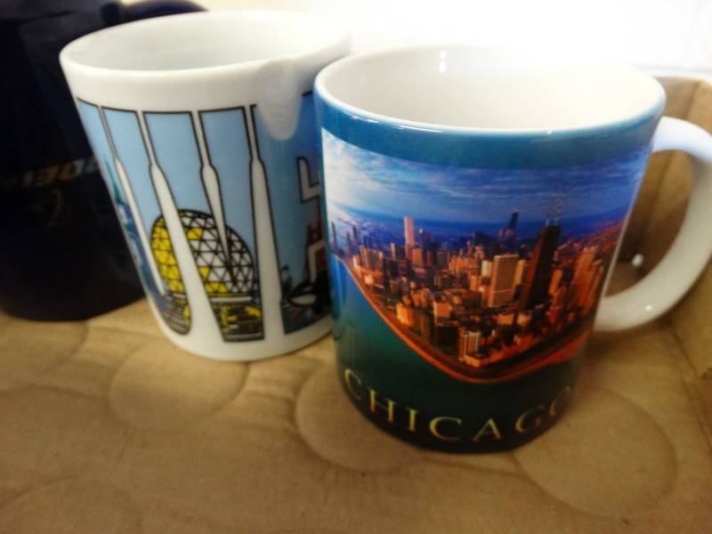lot 7576 image: Lot of themed coffee mugs.