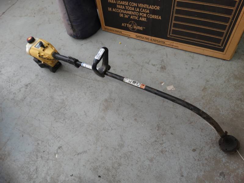 lot 7600 image: Bolens BL100 17cut 31cc weedeater.