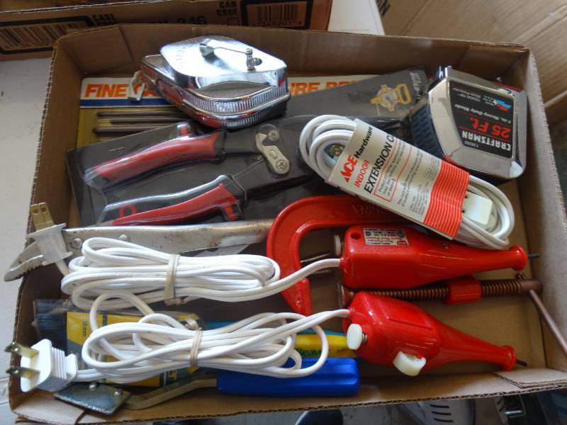 lot 7624 image: Extension cords, measuring tape, paint brush, & more.