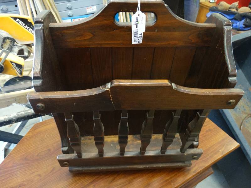 lot 7636 image: Wooden magazine rack has a crack.
