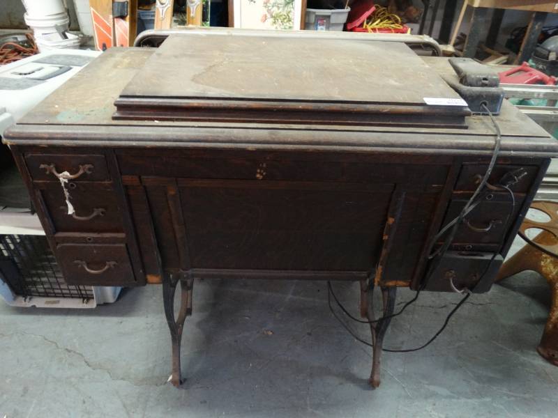 lot 7657 image: Sewing machine & table.