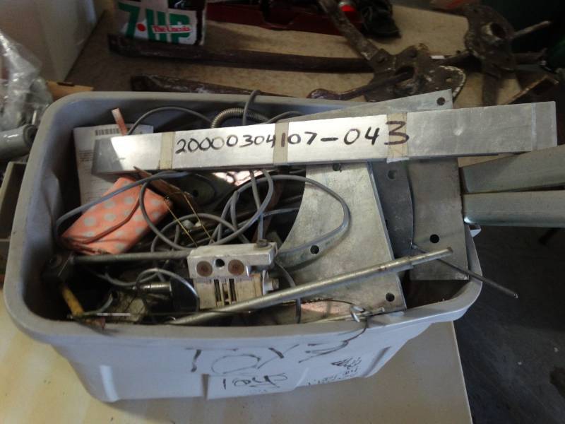 lot 7668 image: Tote full of electrical items.