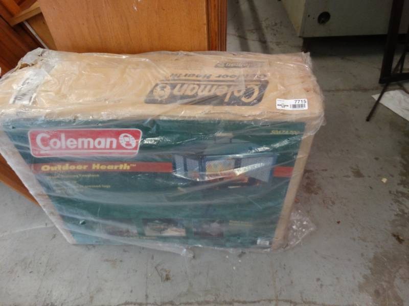 lot 7715 image: Coleman outdoor hearth- New in box