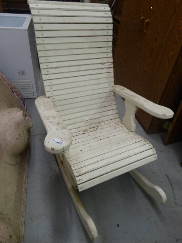 lot 7764 image: Heavy duty wood rocking chair.