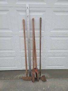 lot 6 image: Long Handle Manual Post Hole Digger hoes, and Johnson Leveling Tool