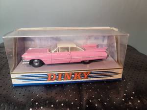 lot 73 image: 1959 Cadillac Coupe DeVille Dinky DY007C Pink Diecast Model