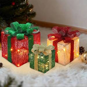 lot 3355 image: Christmas Decorations, 3-Piece Set, Box Ornaments with Bows, Illuminates Christmas Tree Skirts. Suitable for Indoor, Courtyard, and Outdoor Lawn Decorations.