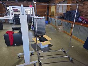 lot 7043 image: Commercial Grade Rolling Garment Racks - Set of 2