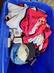 lot 7049 image: Rocky Mountain Vibes Merch Including Baseball Cap, Cards, and Hockey Jerseys