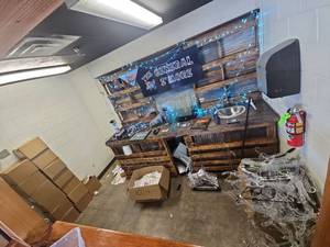 lot 7050 image: Contents of Room Including Hangers, Books, Baskets, Mannequins, and MORE
