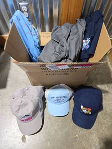 lot 7073 image: Assortment of Rocky Mountain Vibes Merchandise - Baseball Caps &amp T-Shirts