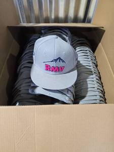 lot 7074 image: Case of Rocky Mountain Vibes Baseball Caps