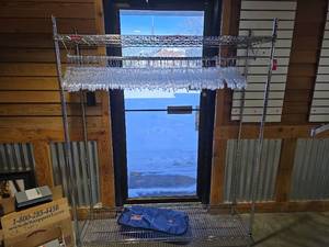 lot 7103 image: Commercial Grade Garment Rack with Clear Hangers