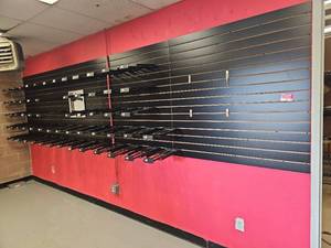 lot 7239 image: 16ft New Era Commercial Retail Hat Display Wall Unit