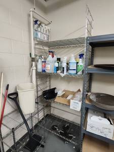 lot 6604 image: 4-Tier Commercial Chrome Wire Storage Shelving Unit W Misc. Cleaning Supplies