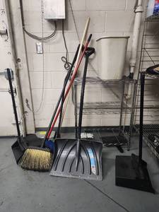 lot 6605 image: Assorted Lot W Snow Shovels, Broom and Dustpans, and 3-Tier Shelving Unit