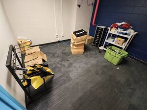 lot 6624 image: Contents of Room Including Rolling Cart, Rolling Storage Bin, Umbrella, and More