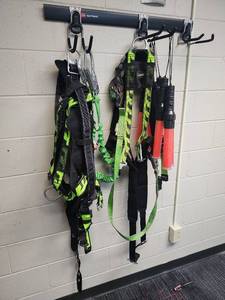 lot 6628 image: Assorted Lot W Manyards Safety Harness (Model 219M), LED Traffic Wands, and Rubbermaid FastTrack Rail