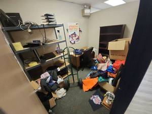 lot 6642 image: Contents of Room Including Office Desk W Chair, Bookshelf, Furniture Dolly, and More