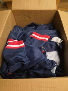 lot 7235 image: Varying Sizes of Rocky Mountain Vibes Numbered Baseball Jerseys