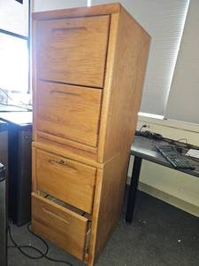 lot 7303 image: Aspen Furniture Oak Filing Cabinet - Set of 2