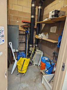 lot 7309 image: Assorted Lot of Commercial Cleaning Supplies W VersaFill Dispensing System, Shop Brooms, and More