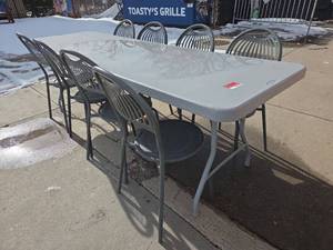 lot 7367 image: 8ft Cosco Folding Table with (8) Metal Chairs