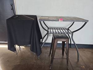 lot 9011 image: Bar Height Slate Top Bar Table W Bar Stool and Metal Rack