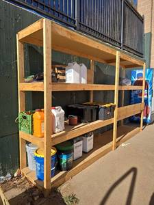 lot 2520 image: 12ft Wooden  Shelf W Maintenance Supplies