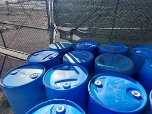 lot 2541 image: 55 Gallon Blue Plastic Drums - Set of 9
