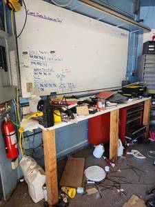 lot 2555 image: Contents of Wall Including Tool Chest, White Board, Tools, and More