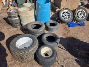 lot 2563 image: Assorted Lot W Golf Cart Tires,  Wheels, Metal Stakes, and More
