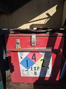 lot 2568 image: Red Metal Explosive Storage Box with NFPA Diamond Label