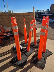 lot 2581 image: Traffic Delineator Posts with Rubber Bases - Set of 8