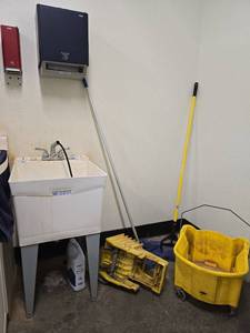 lot 2761 image: Janitorial Supplies Including Utility Sink, Mop Bucket, and More