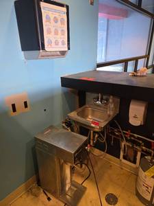 lot 9043 image: Commercial Sink, Curtis G3 D500 Commercial Coffee Grinder, and Dispensers