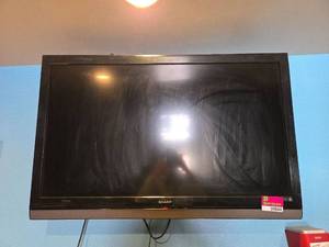 lot 9044 image: Sharp 42 LCD TV (Model LC-42SB48UT) W Wall Mount