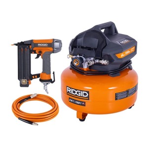 lot 4253003 image: 6 Gal. 150 PSI Portable Electric Oil-Free Jobsite Pancake Air Compressor with 25 ft. Air Hose and 18GA Brad Nailer