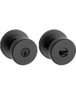 lot 42530193 image: KwiksetPismo Round Matte Black Exterior Entry Door Knob Featuring SmartKey Security with Microban Antimicrobial Technology MSRP $37.97