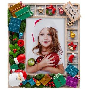 lot 2081 image: FINE PHOTO GIFTS Santas Workshop Light Up Resin 5 x 7 Picture Frame