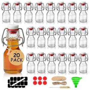 lot 5730 image: Ruckae 20 Pack 2oz Swing Top Glass Bottles,Flip Top Glass Bottle with Lids Sealable Kombucha Bottle for Brew Beer Syrup Vanilla Extract Air Tight Bottles for Gift (2 oz 20 pack) Some of the containers broken