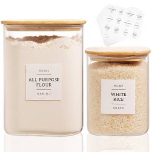 lot 7449 image: 2 Pack large Square Glass Flour and Sugar Containers with 132 Kitchen Pantry Labels - 110 floz & 51 floz - Glass Jars with Airtight Bamboo Lid - Glass Rice Canisters for Coffee, Pasta, Cookie, Cereal (1 Broken)
