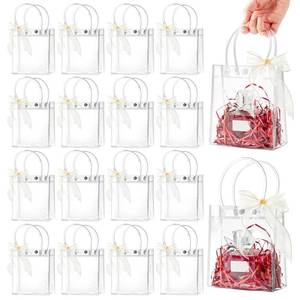 lot 14122 image: Ohuimrt 50 PCS Clear Plastic Gift Bags with Handles, Reusable Party Favor Bags with Ribbon Transparent Gift Wrap Bags Bulk for Weddings Birthdays, 5.9 x 4.92 x 2.75 Inches