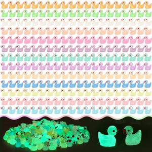 lot 14225 image: GADIEDIE 260pcs Luminous Mini Resin Ducks,Glow in The Dark Tiny Duck for Home Hide Prank Game Dollhouse Decor Aquarium Potted Miniature Landscape DIY Ornament
