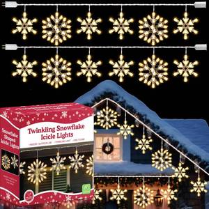 lot 9754 image: 2 Pack Twinkling LED Christmas Snowflake Lights with 6 Drops, 8.8FT 14 of 100 Random Twinkle Christmas Snowflake String Lights, Connectable Hanging Plug in Icicle Light for House Roof (Warm White)