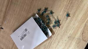 lot 14382 image: Mudder 100 Count Christmas Tree Lights Replacement Bulbs Mini Incandescent Christmas Lights 2.5v 0.425 Watt Warm Prelit Xmas Tree Decoration(Green Base with Warm White Bulb)