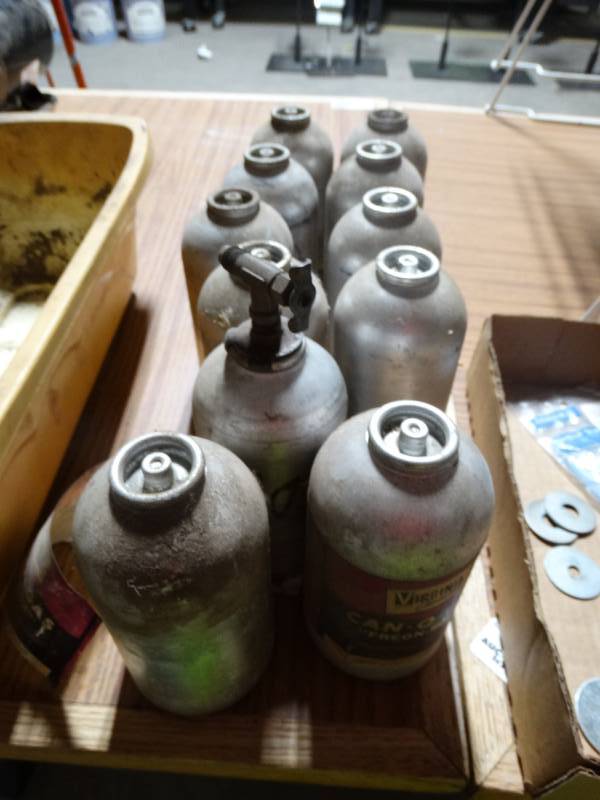 lot 14039 image: 10 unopened cans of Freon-502